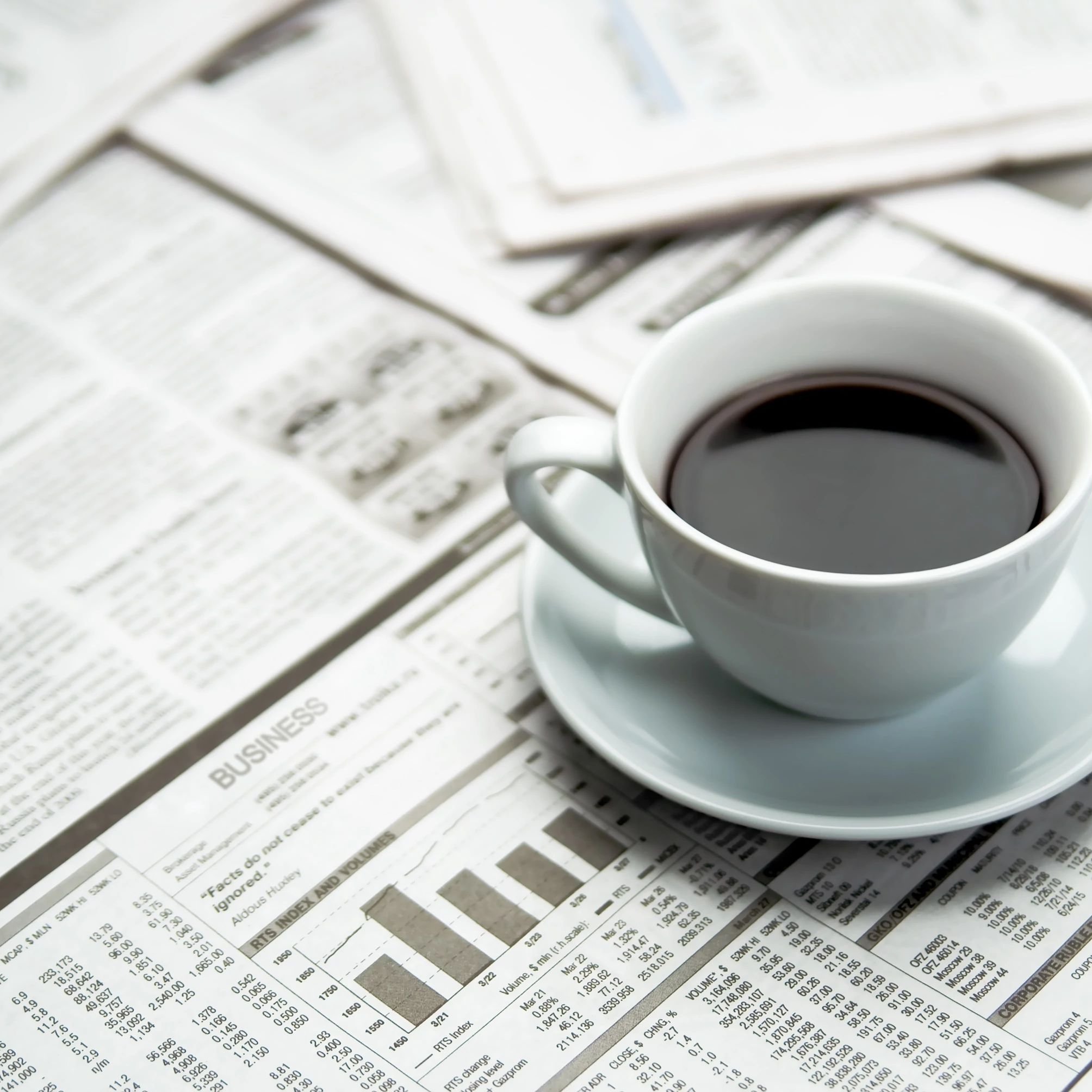 A cup of coffee on the newspaper in Huntington Beach, CA